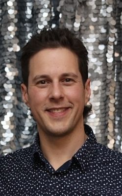 Portrait of Ty Ouellet, Associate.